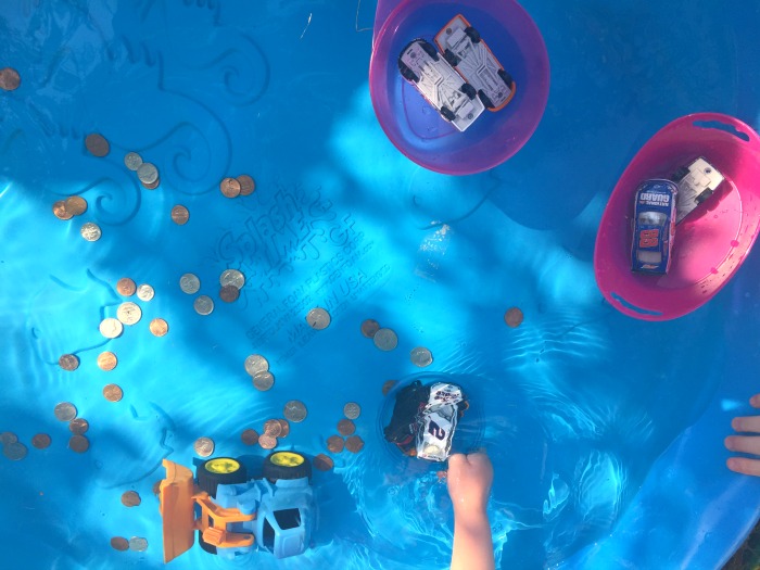 Kiddie pool games can include experiments like the one pictured where various items are seen either sinking or floating in a kiddie pool.
