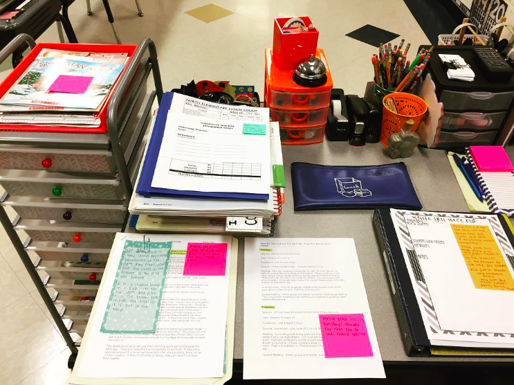 Substitute teacher materials spread out on a desk